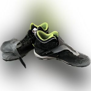 Black and neon green football cleats. Under Armour